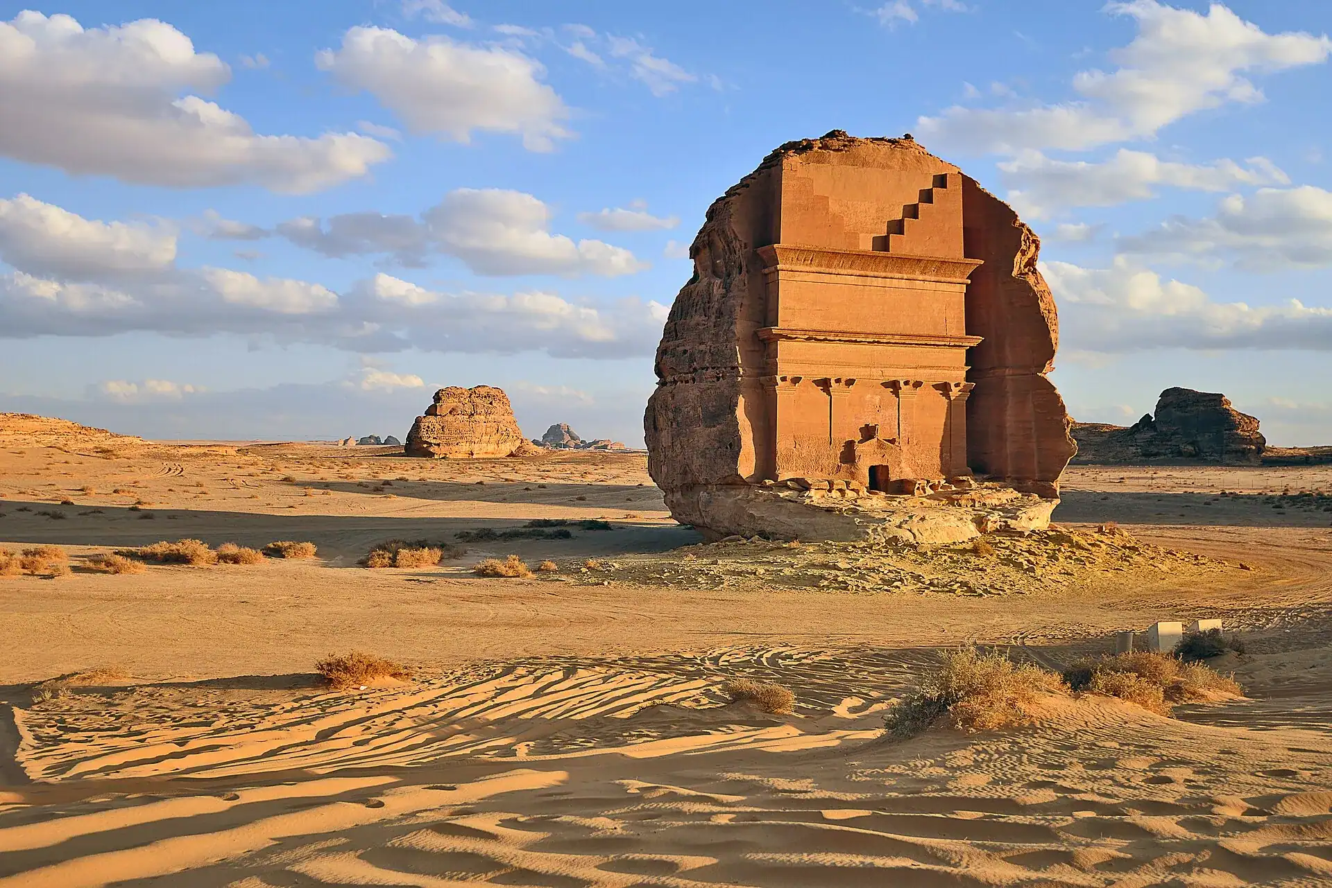 A Nabataean tomb carved from a sandstone outcrop at Hegra, Al Ula