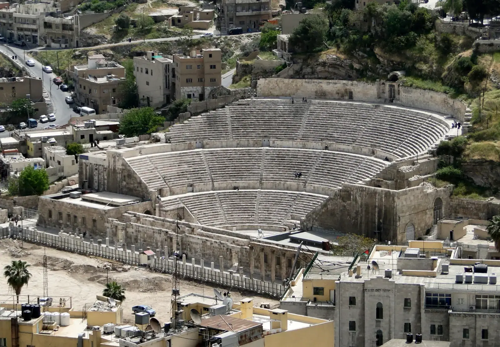 Aerial view of the Roman Theatre of Amman with the city hillside behind