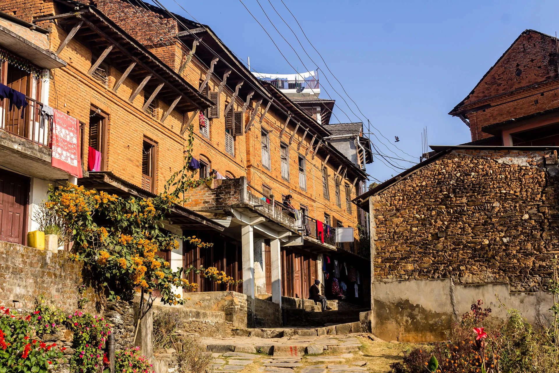 Traditional Newari brick and timber houses on a lane in Bandipur, Nepal