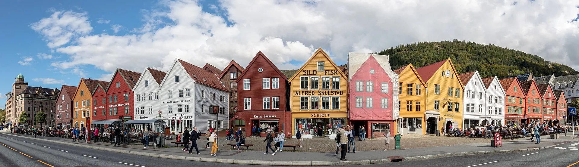 Bryggen wharf in Bergen, Norway, with colourful historic wooden buildings along the harbour
