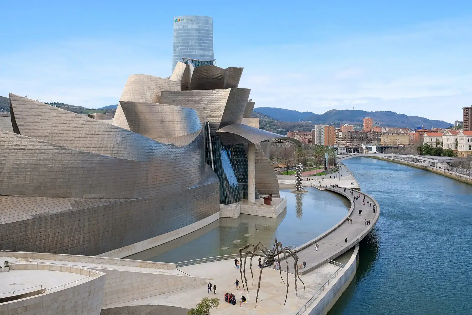 Guggenheim Museum Bilbao with Maman spider sculpture and Nervion river