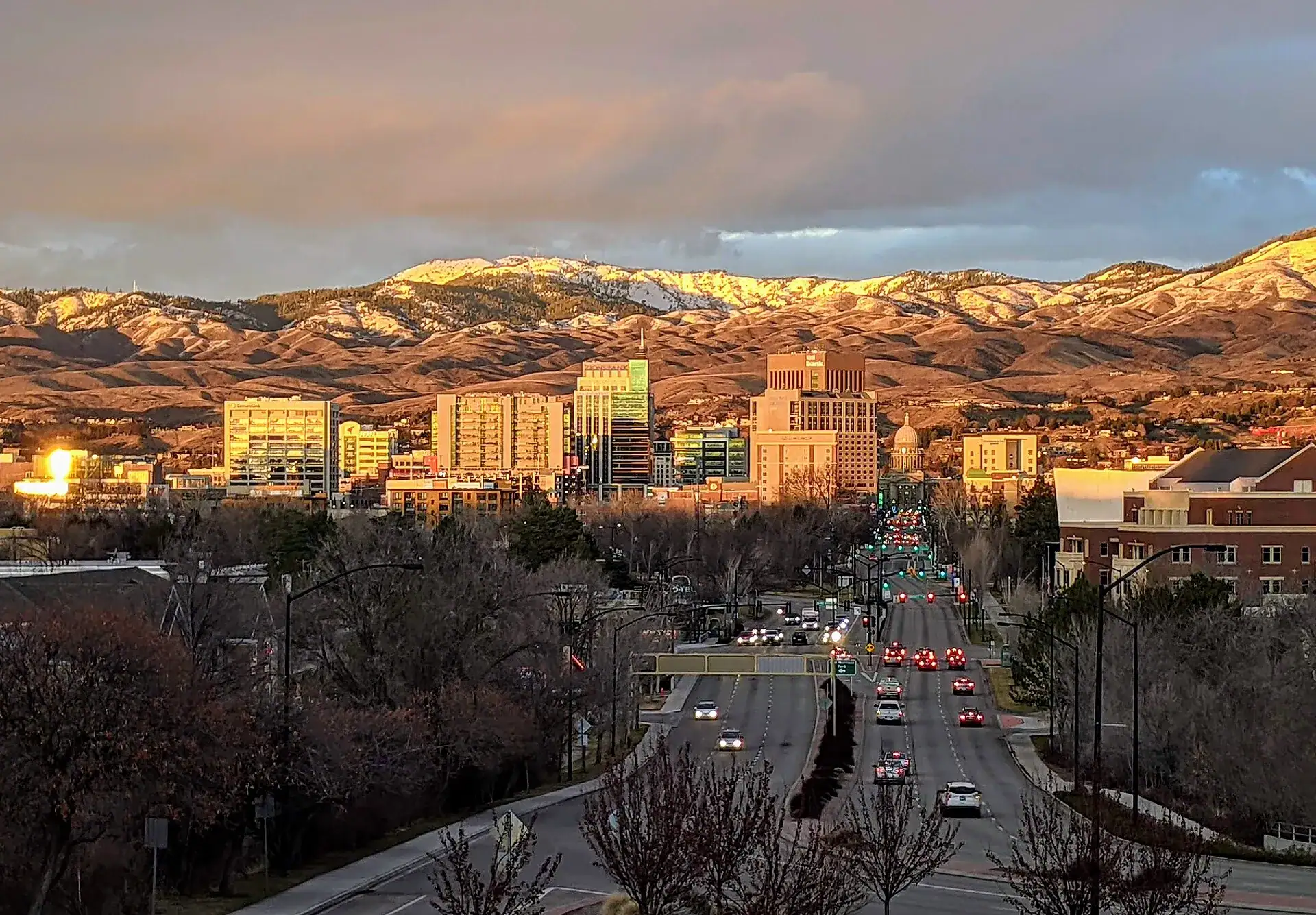 Boise at dusk with the foothills behind it
