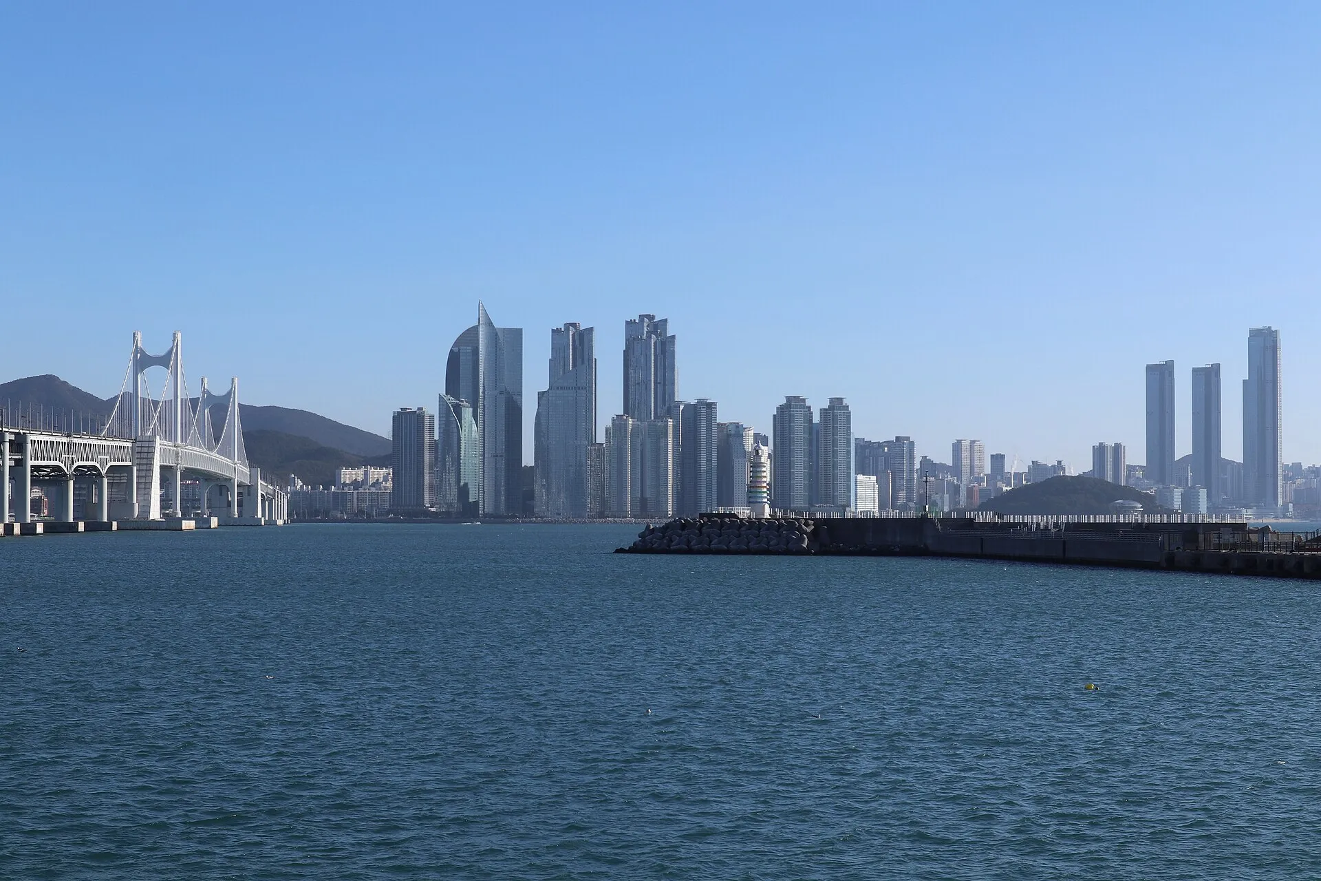 Busan skyline with Gwangan Bridge, Marine City skyscrapers, and LCT Landmark Tower