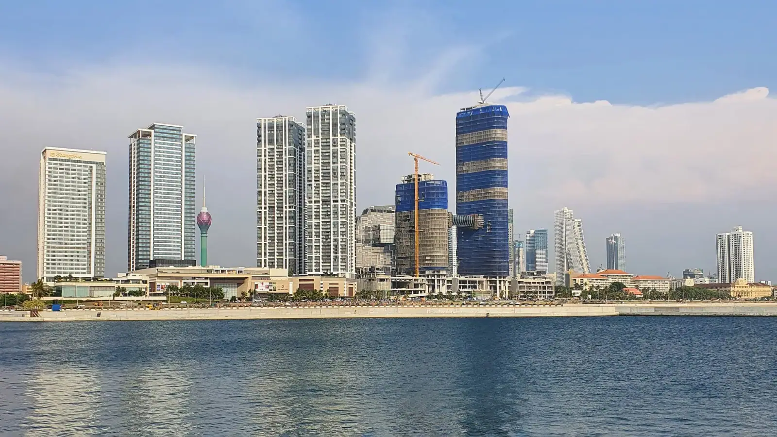 Colombo skyline seen from Colombo Port City, with the Lotus Tower and modern high-rises along the waterfront