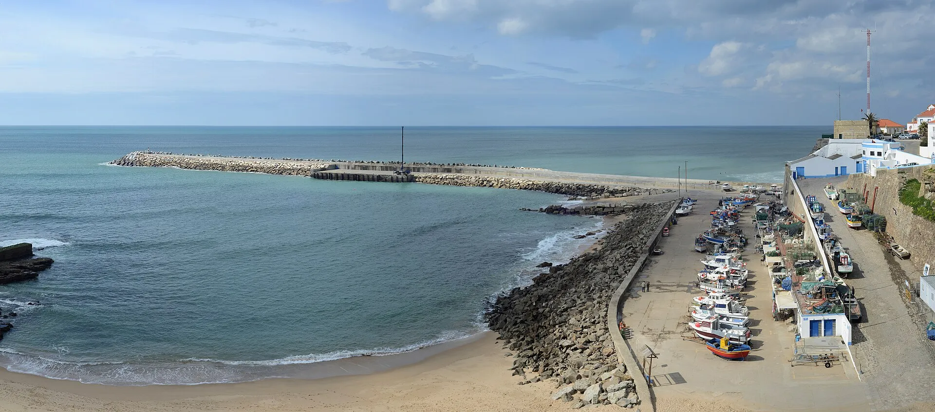 Praia dos Pescadores beach and fishing harbour in Ericeira, Portugal
