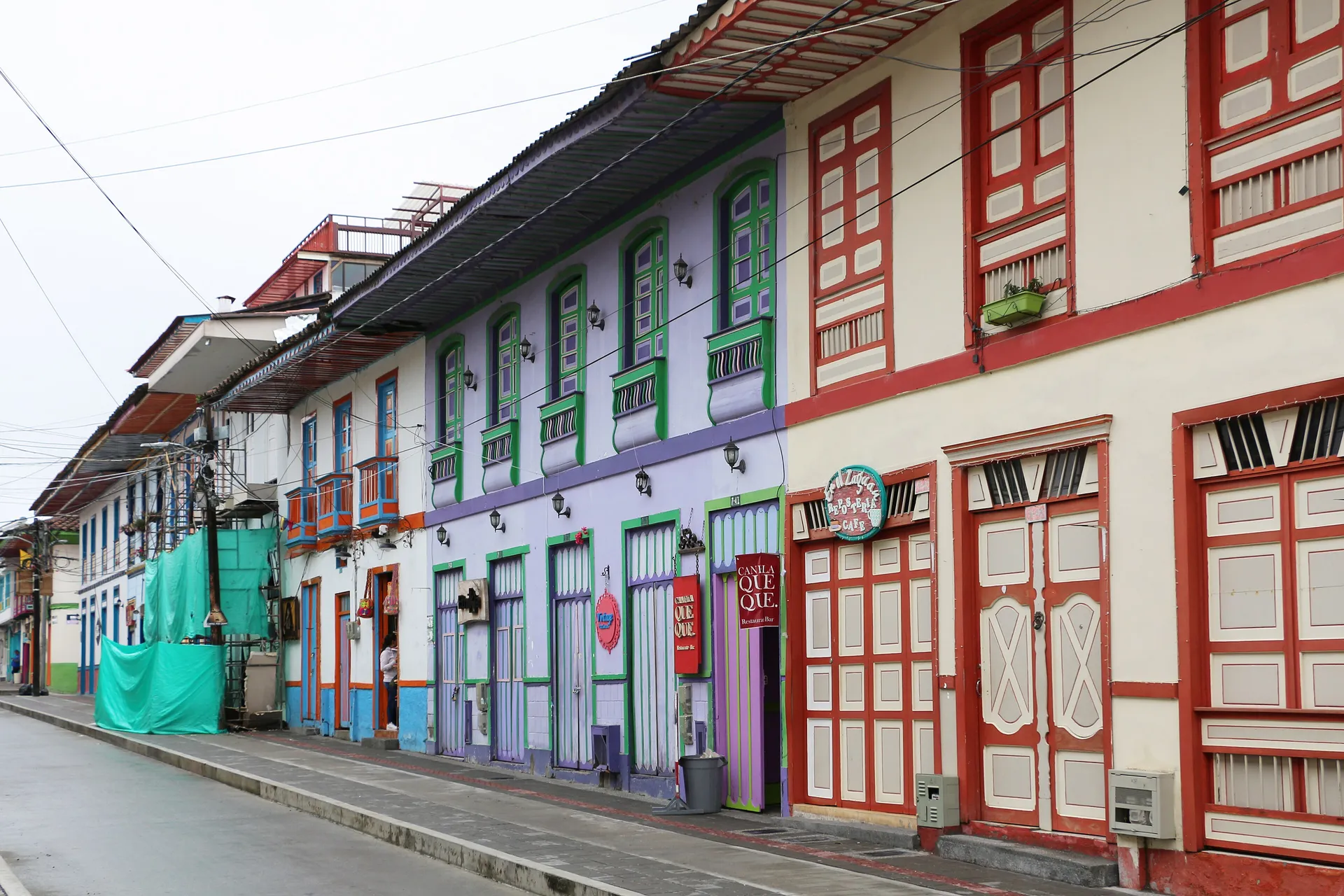 Brightly painted colonial facades on a street in Filandia, Colombia