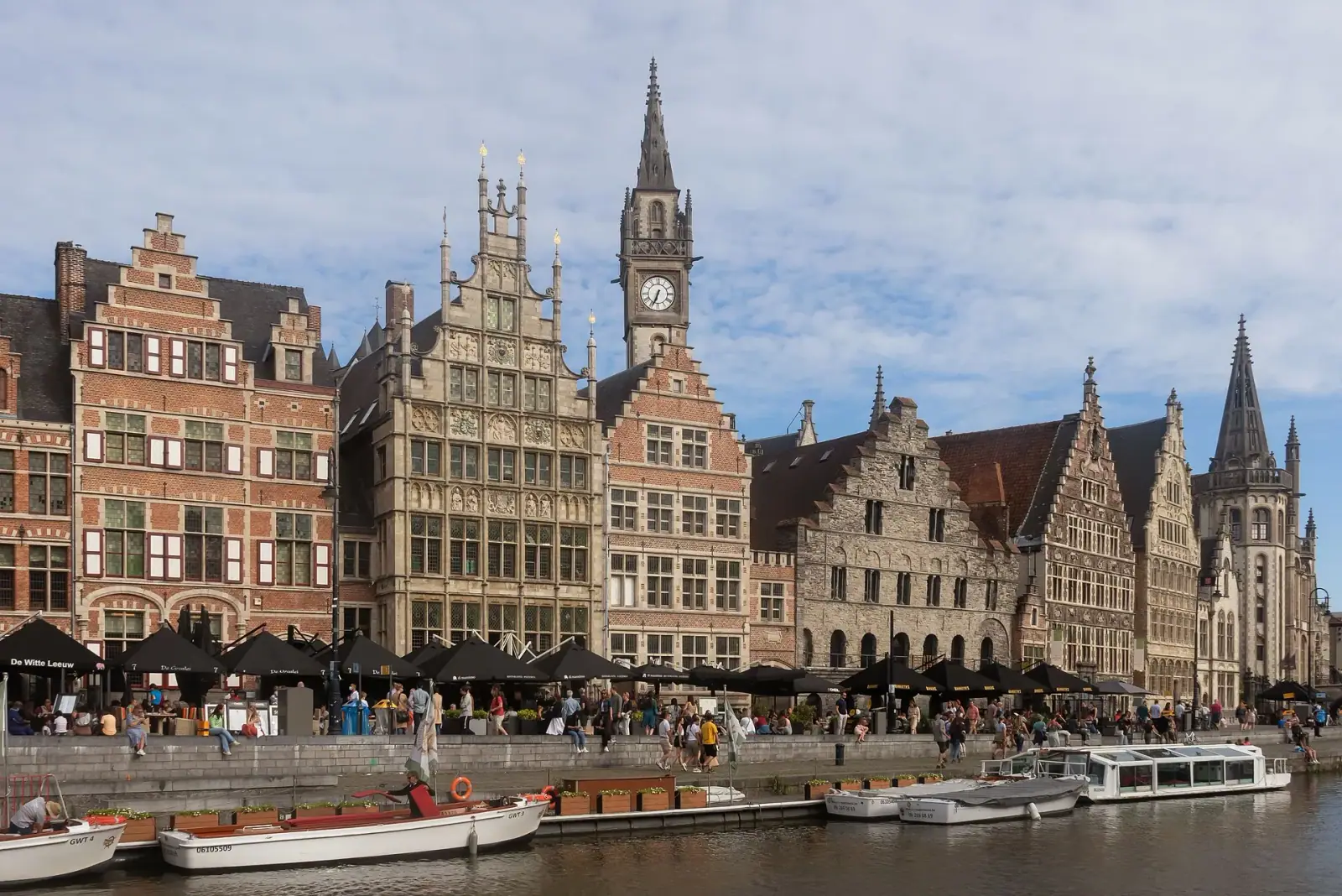 Ghent Graslei guild houses and canal on a sunny day