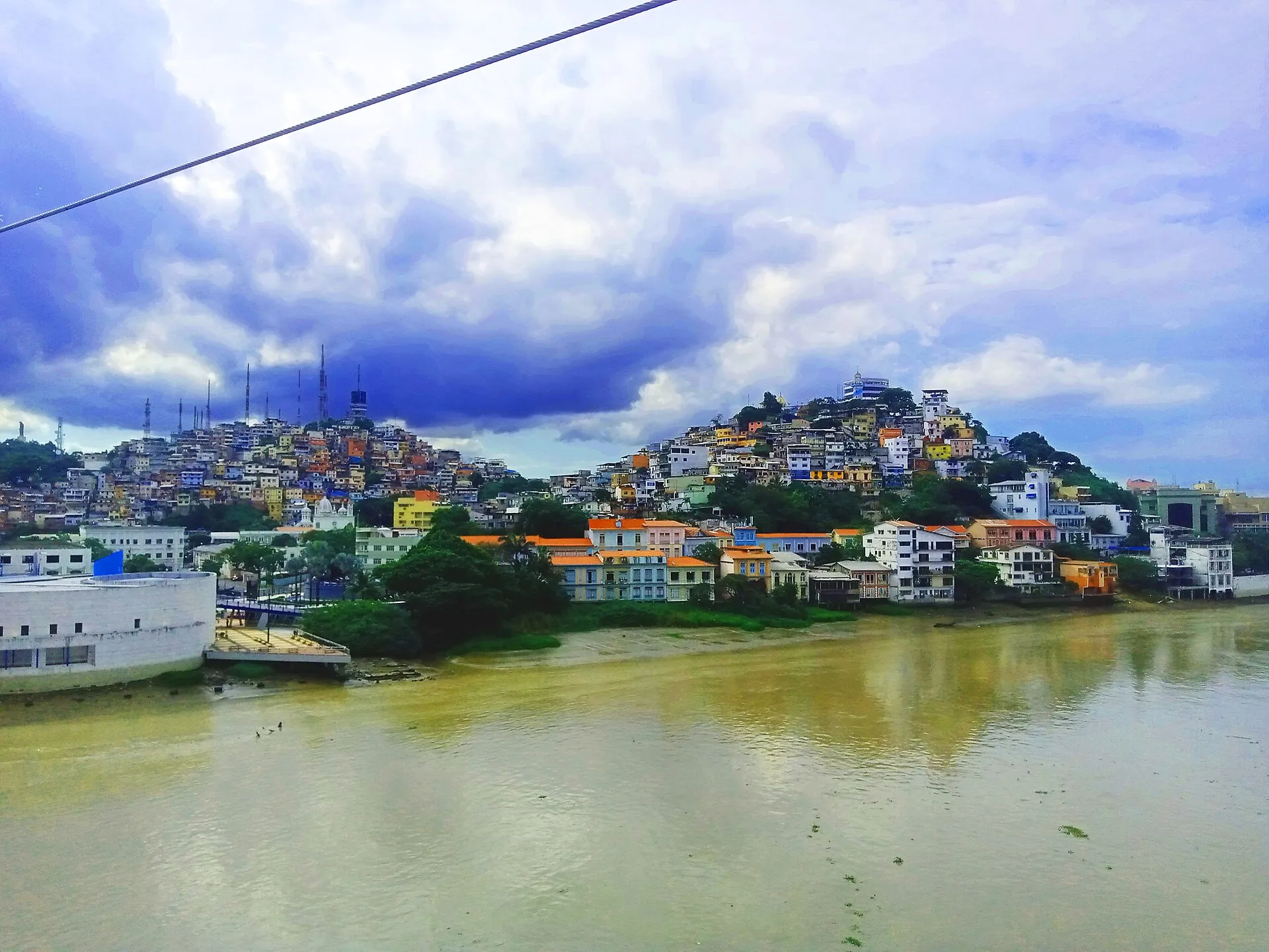 Colorful hillside houses of Cerros Santa Ana and del Carmen rising above the Guayas River, Guayaquil