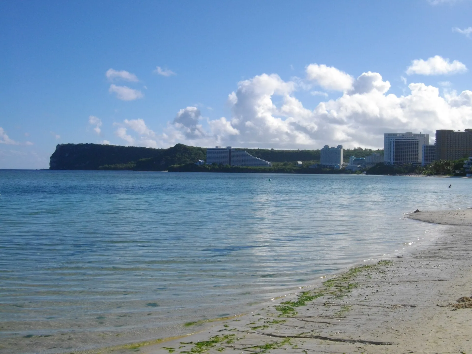 Tumon Bay on Guam, with the Two Lovers Point cliff beyond