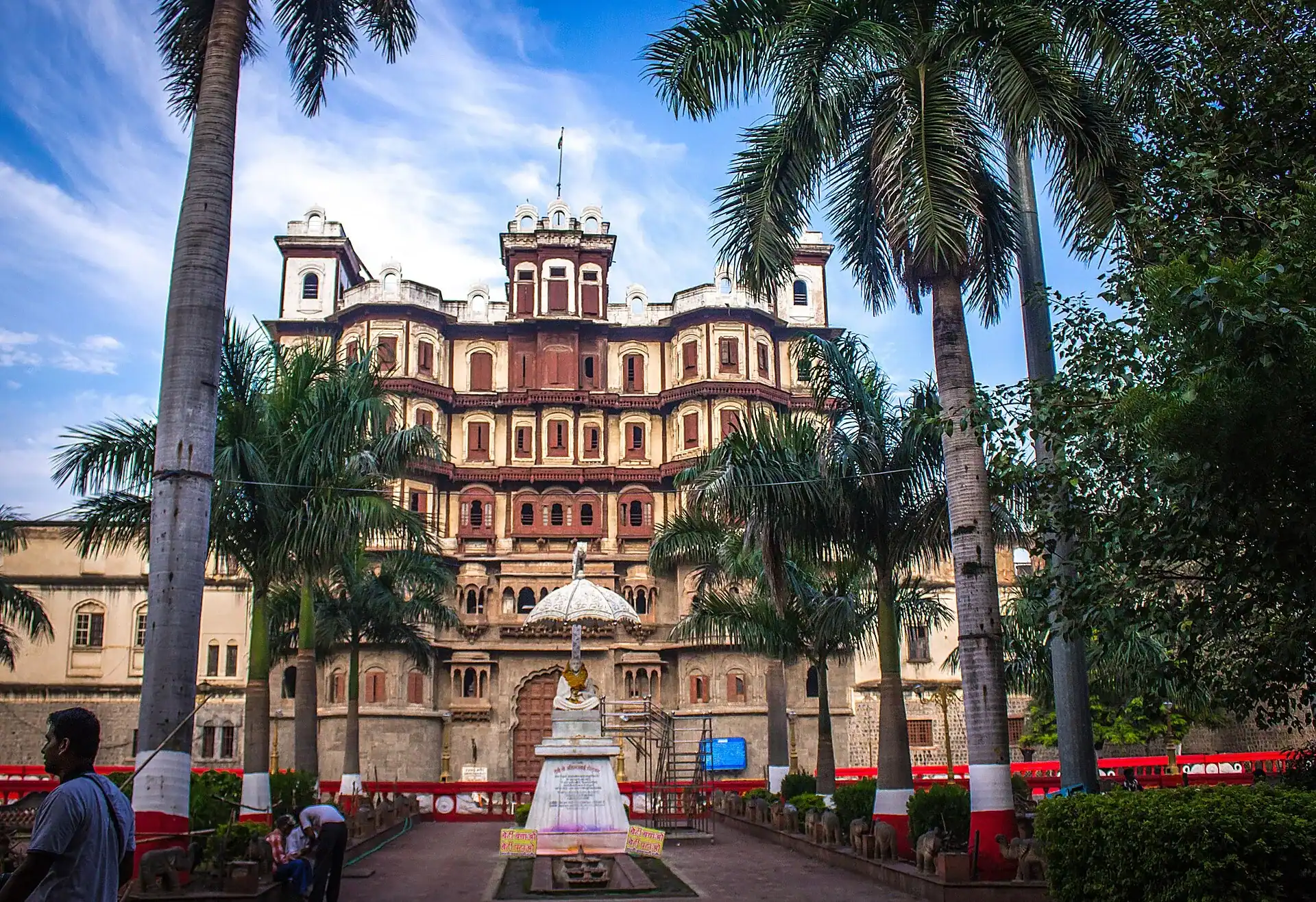 The Rajwada palace in Indore, behind its line of palms