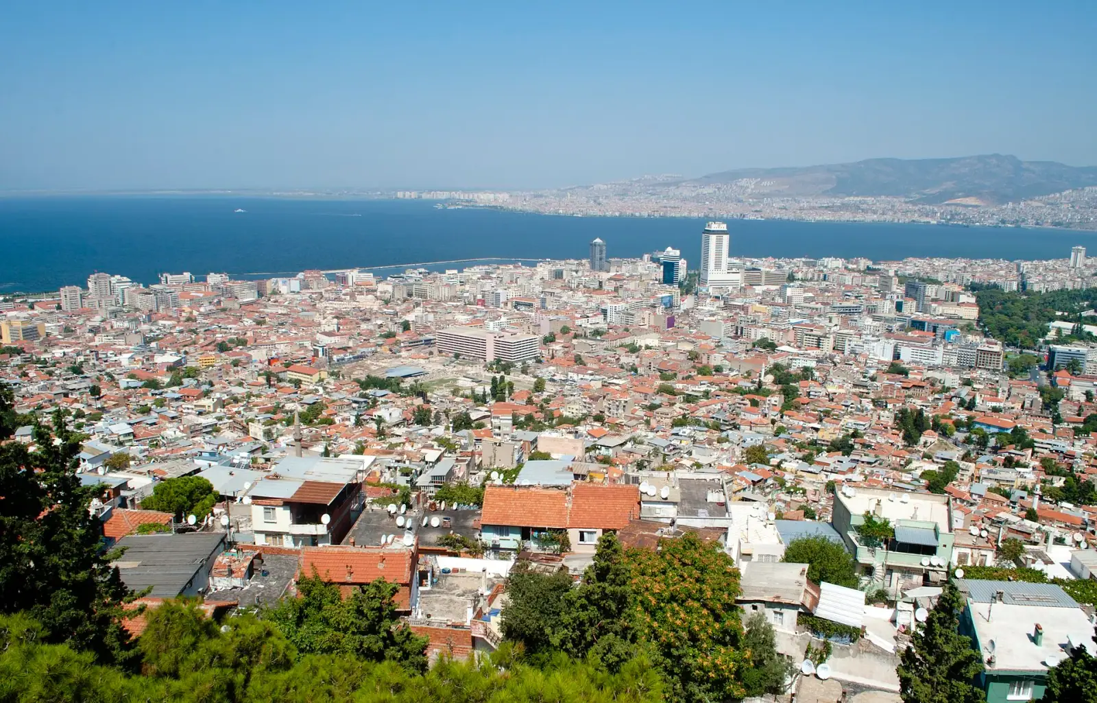 Panoramic view of Izmir cityscape with the Gulf of Izmir and terracotta rooftops