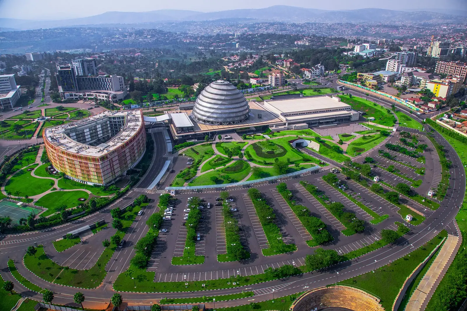 Aerial view of Kigali Convention Centre dome with the city spread across the hills