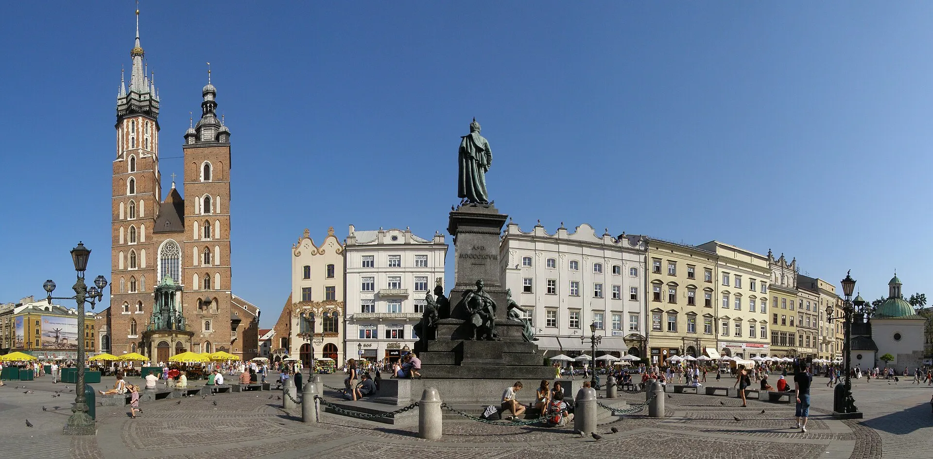 Krakow Main Market Square with St. Mary's Basilica and Adam Mickiewicz Monument