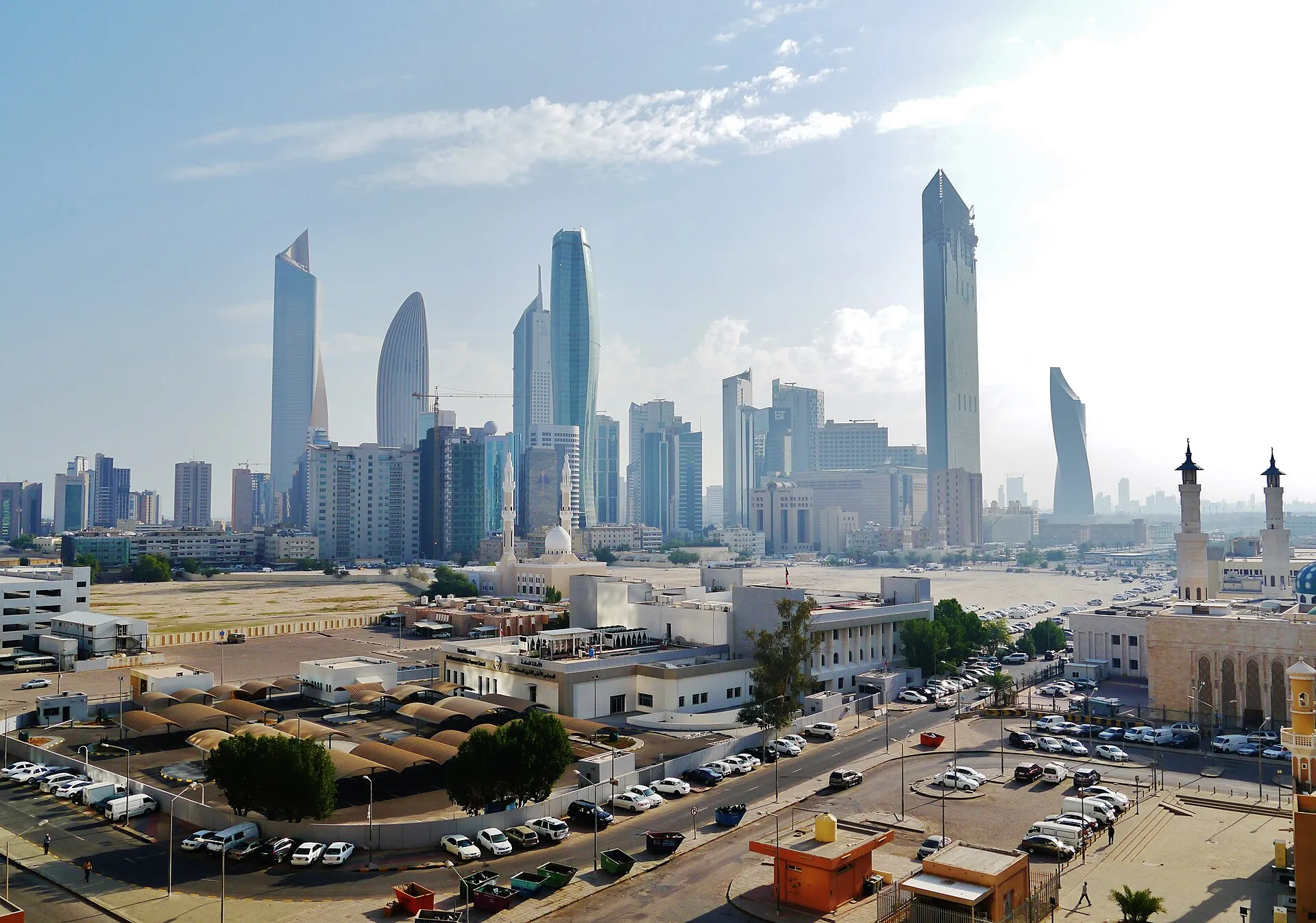 Kuwait City skyline with skyscrapers and mosque in the foreground