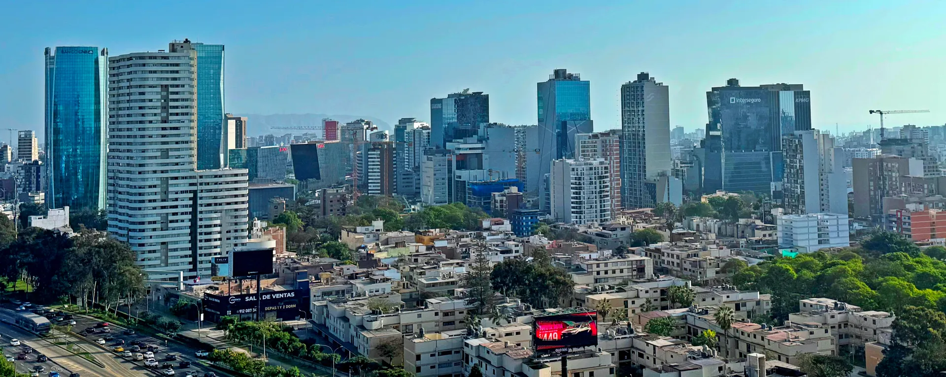 Panoramic view of Lima's San Isidro financial district skyline with modern glass towers