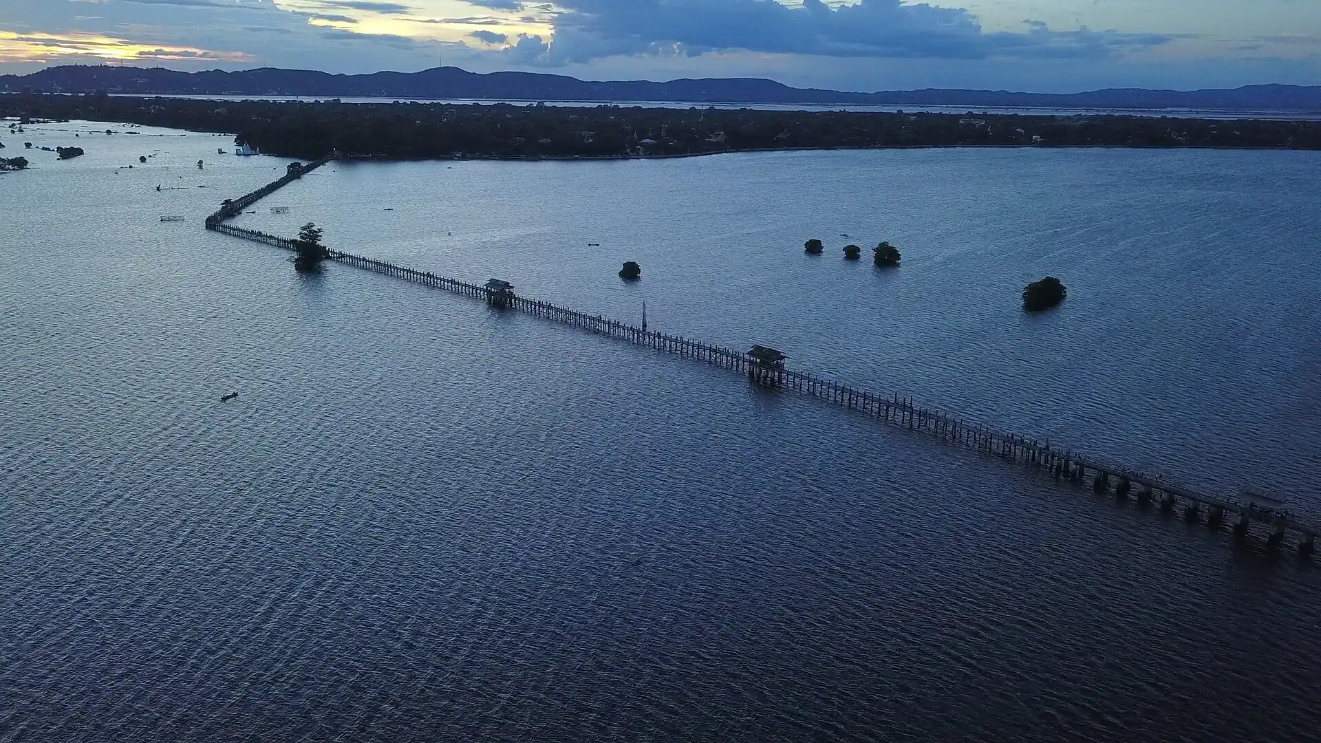U Bein Bridge outside Mandalay, a teak footbridge a kilometre long across Taungthaman Lake