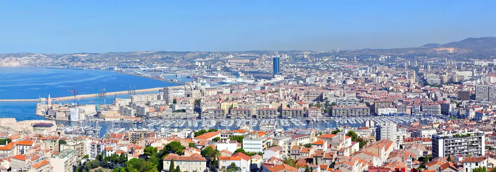 Aerial panorama of Marseille showing the Vieux-Port harbor and city skyline