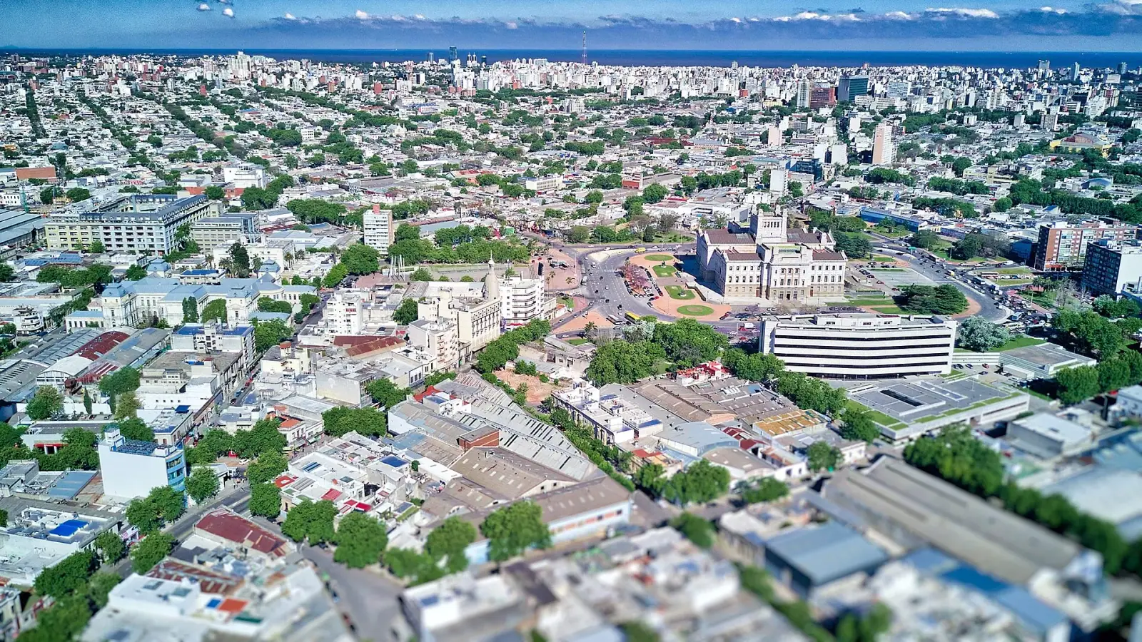 Aerial view of Montevideo with the Palacio Legislativo and the Rio de la Plata in the background