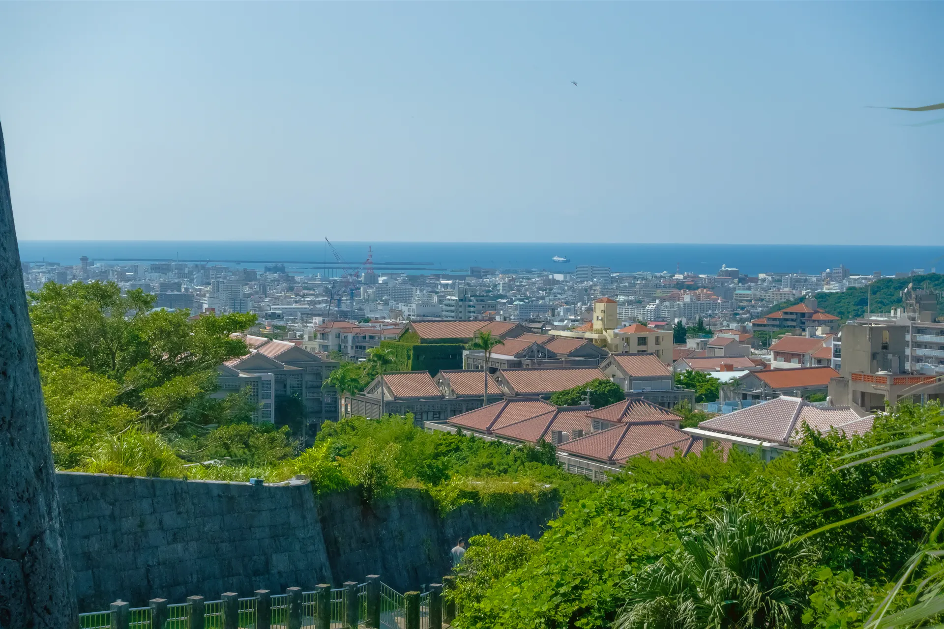 The city of Naha and the ocean viewed from Shuri Castle Park, Okinawa, Japan