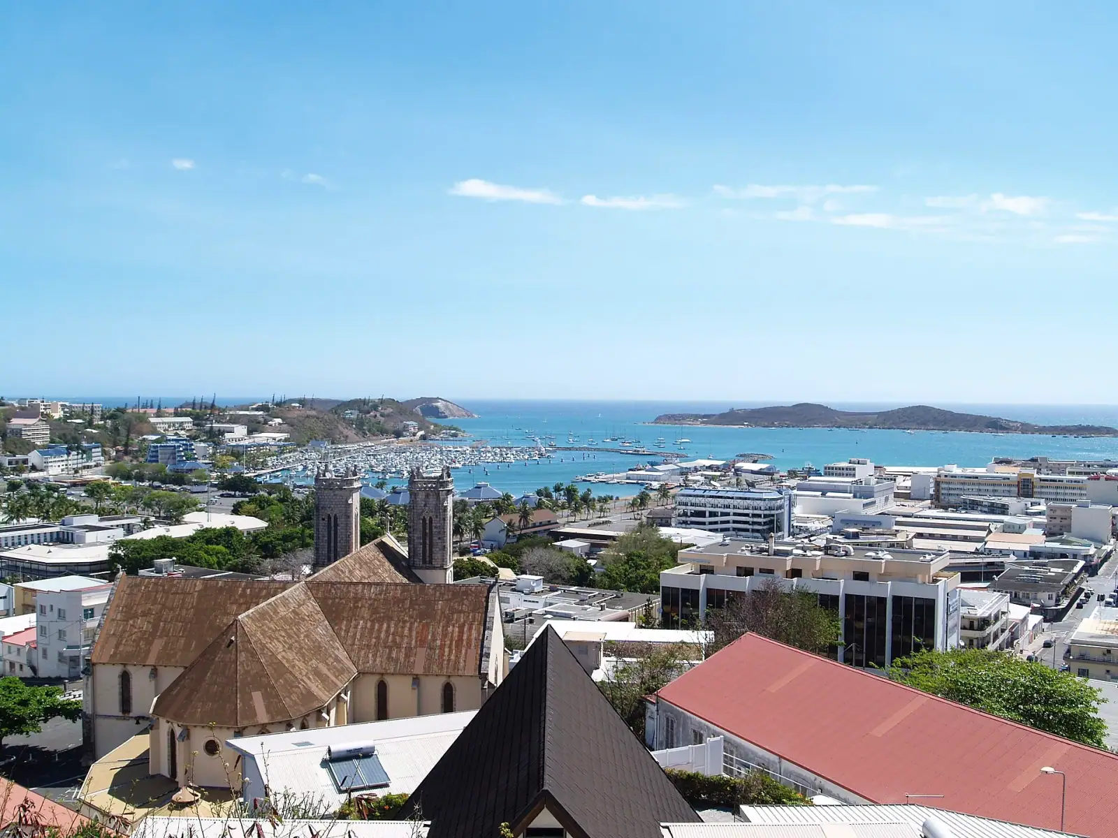 Panoramic view of Nouméa city centre with Saint-Joseph Cathedral and marina