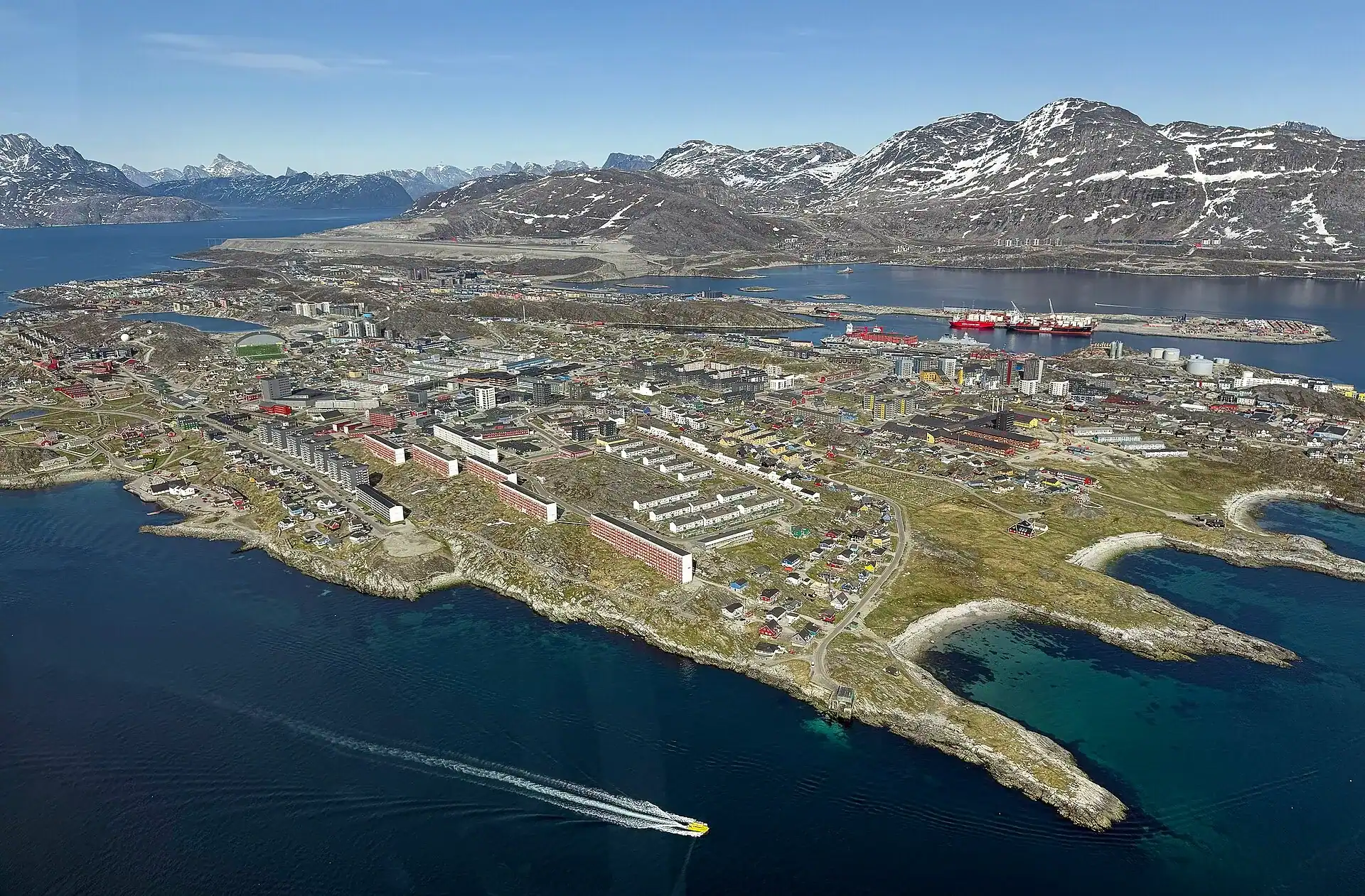 Nuuk on its peninsula with the mountains behind