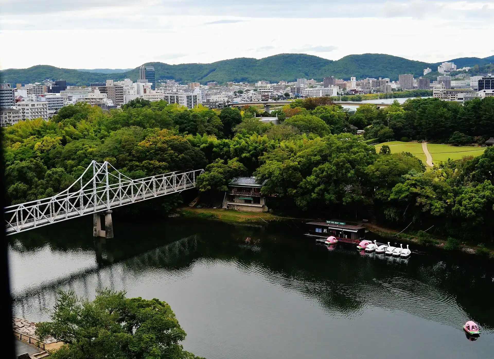 The river and Korakuen garden at Okayama with the city behind