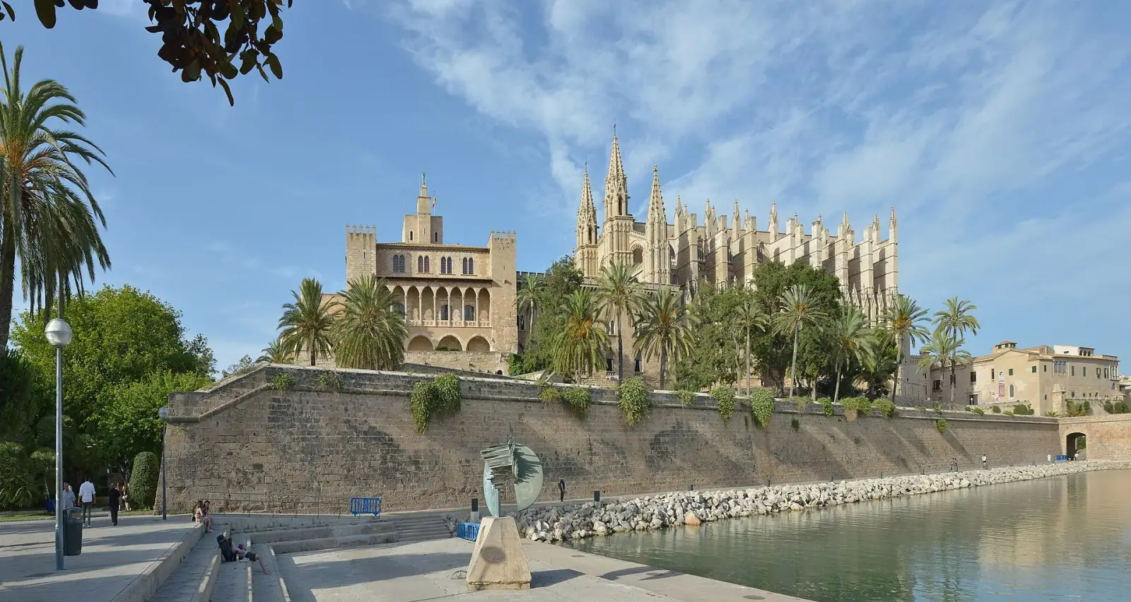 La Seu Cathedral and Royal Palace of La Almudaina rising above the waterfront promenade in Palma de Mallorca