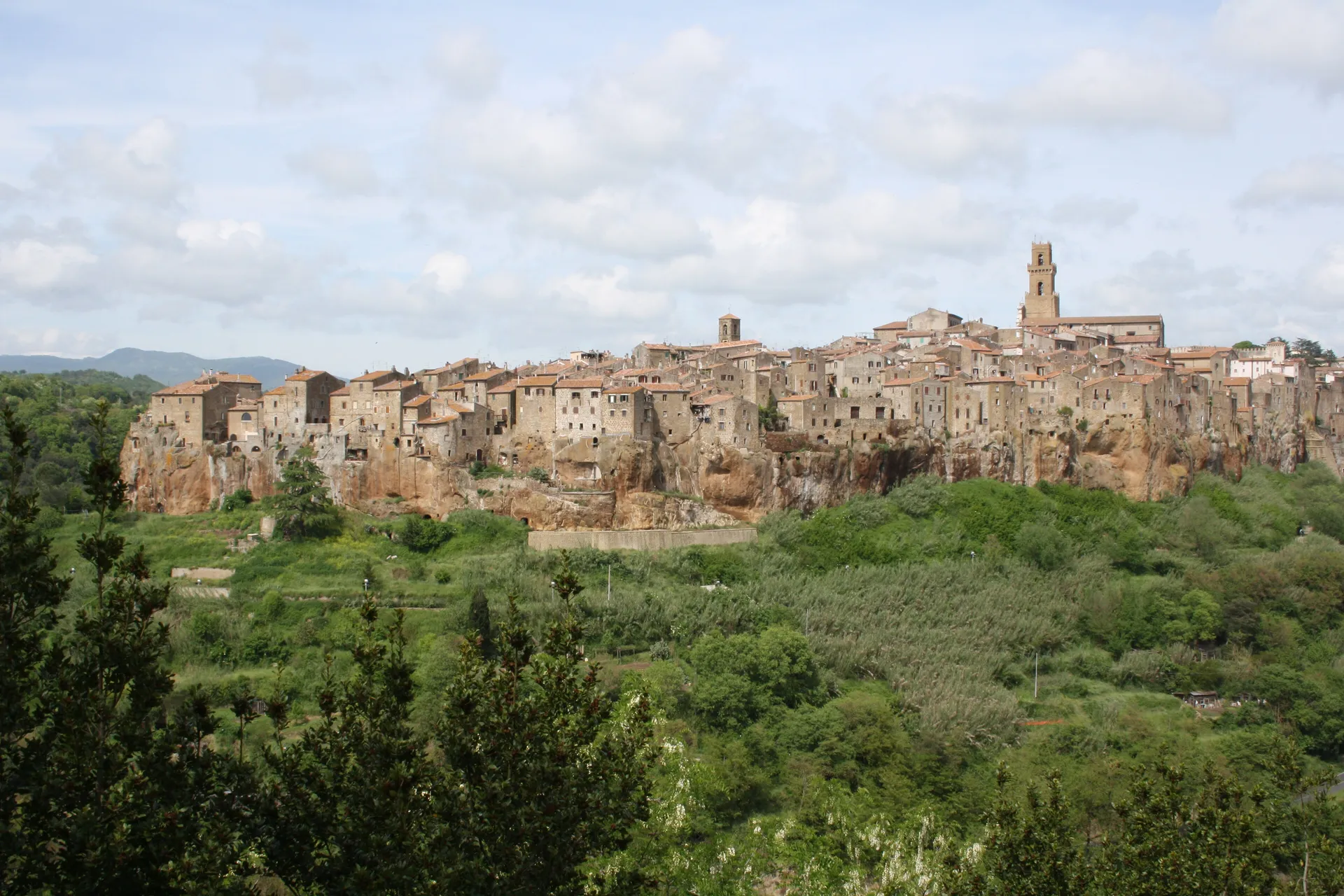 The town of Pitigliano rising from a tufa rock cliff, Tuscany, Italy