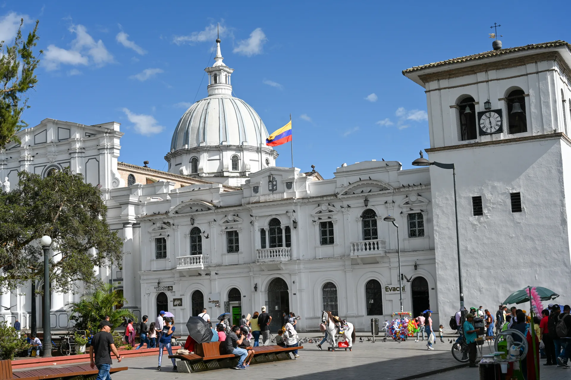 The white cathedral and clock tower on Parque Caldas in Popayan, Colombia