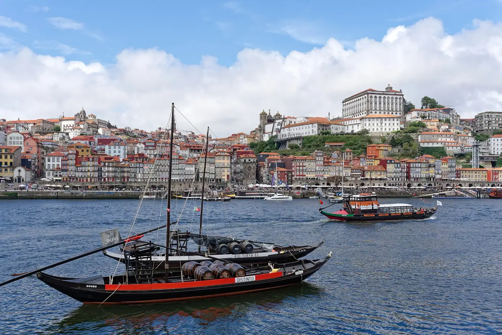 Porto's Ribeira waterfront with rabelo boats on the Douro River