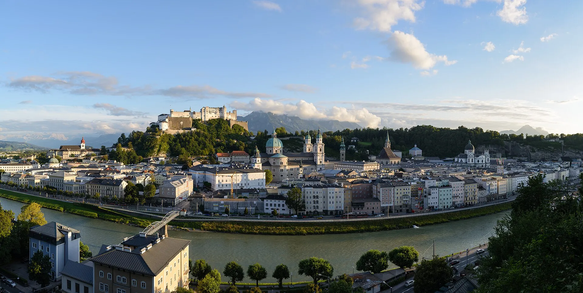 Salzburg Altstadt panorama at golden hour with Hohensalzburg Fortress and Salzach river