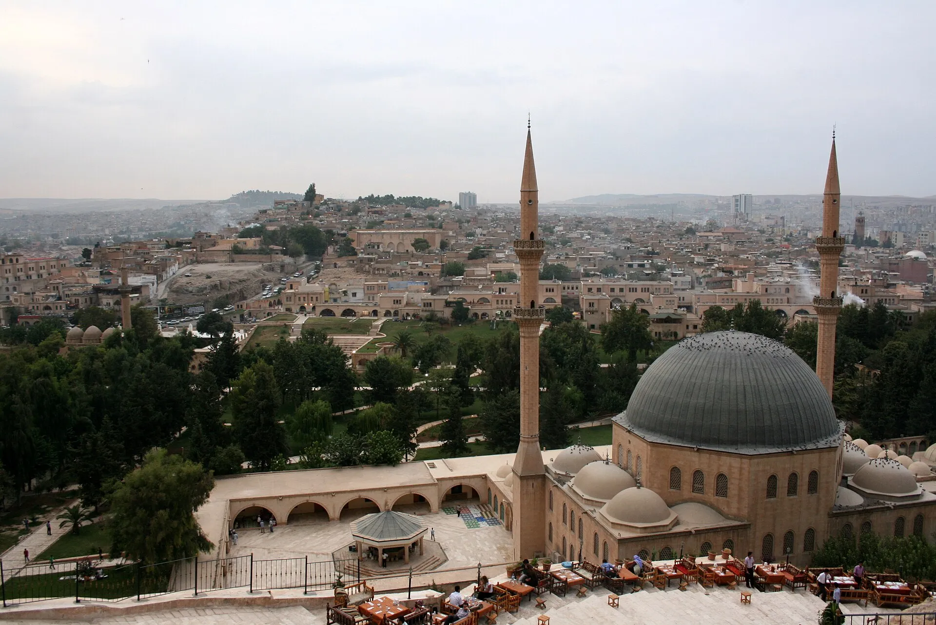A mosque and the city of Sanliurfa behind it