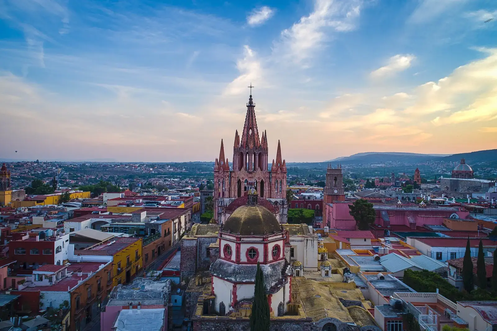 Aerial view of San Miguel de Allende with the Parroquia de San Miguel Arcangel at sunrise