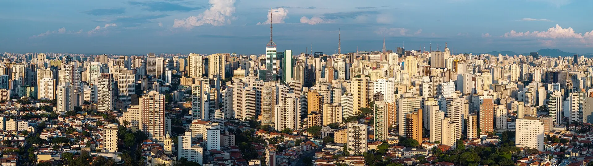 Aerial panoramic view of São Paulo skyline at golden hour