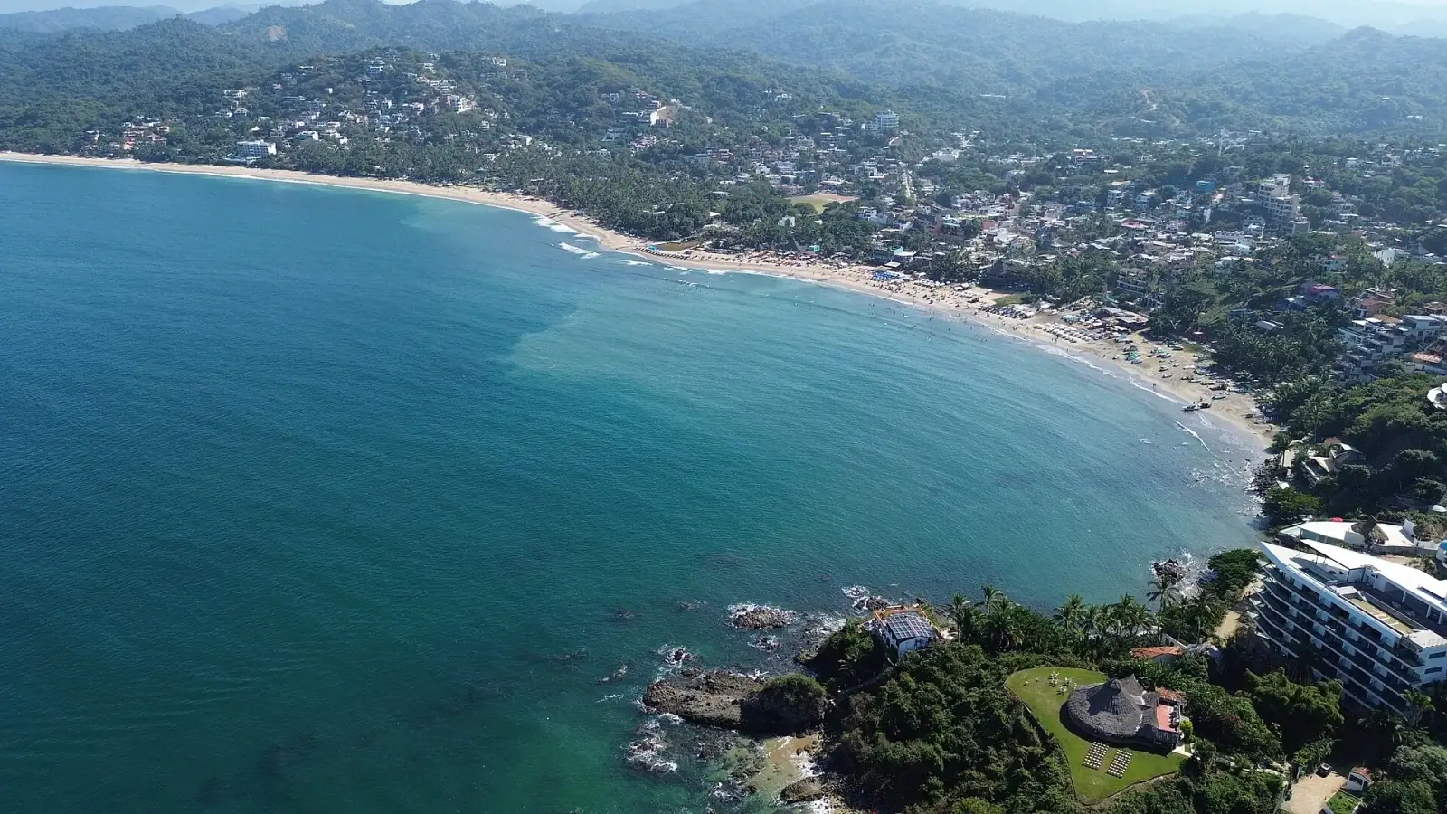 Aerial drone view of Sayulita bay, beach and village, Nayarit, Mexico