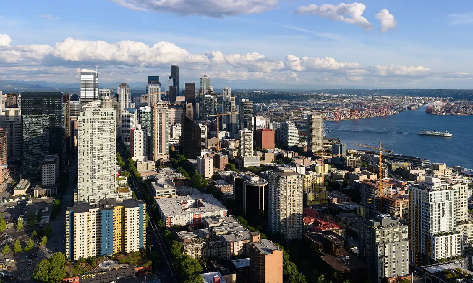 Seattle downtown skyline and Elliott Bay seen from the Space Needle on a sunny day