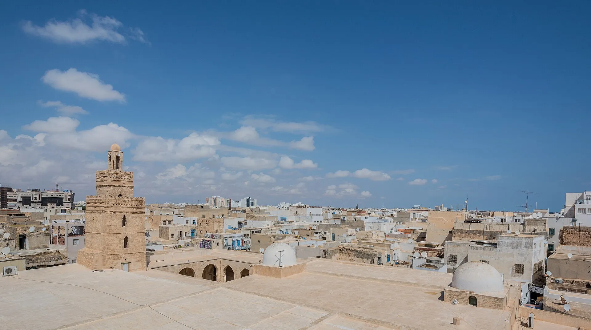 The minaret of the Great Mosque over the rooftops of the Sfax medina