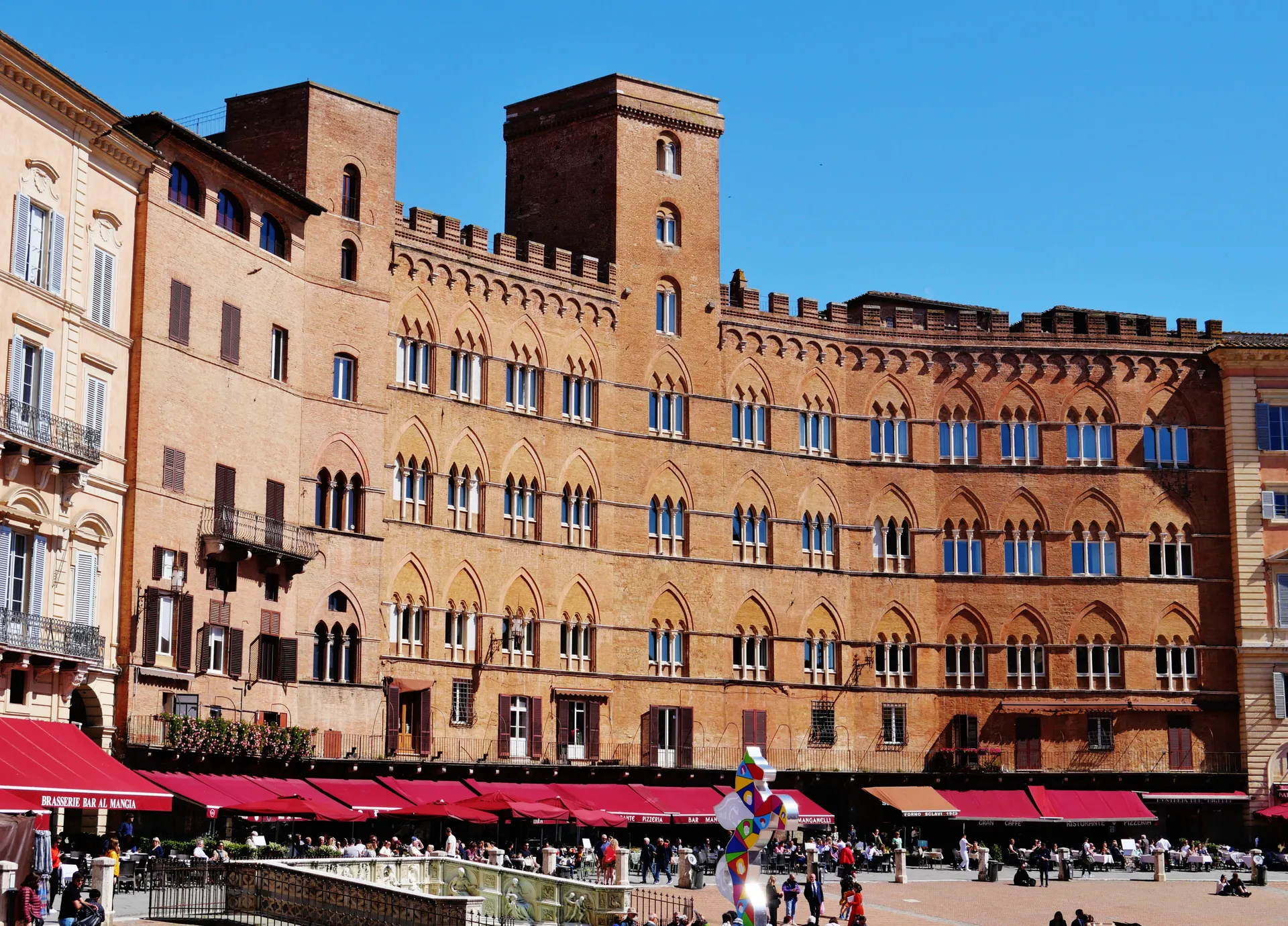 Piazza del Campo and its medieval palaces in Siena, Italy