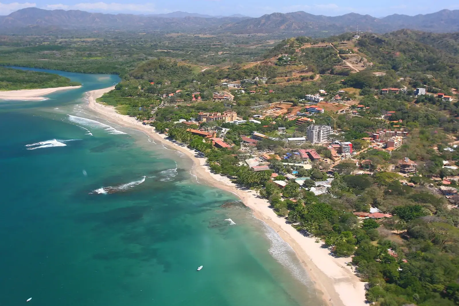 Aerial view of Tamarindo beach town and river mouth, Guanacaste, Costa Rica