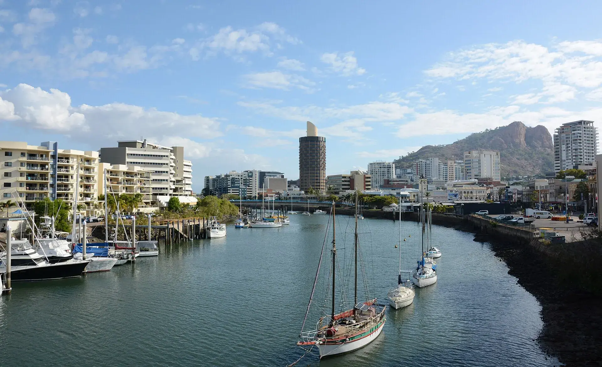 The marina on Ross Creek at Townsville, with Castle Hill behind the city