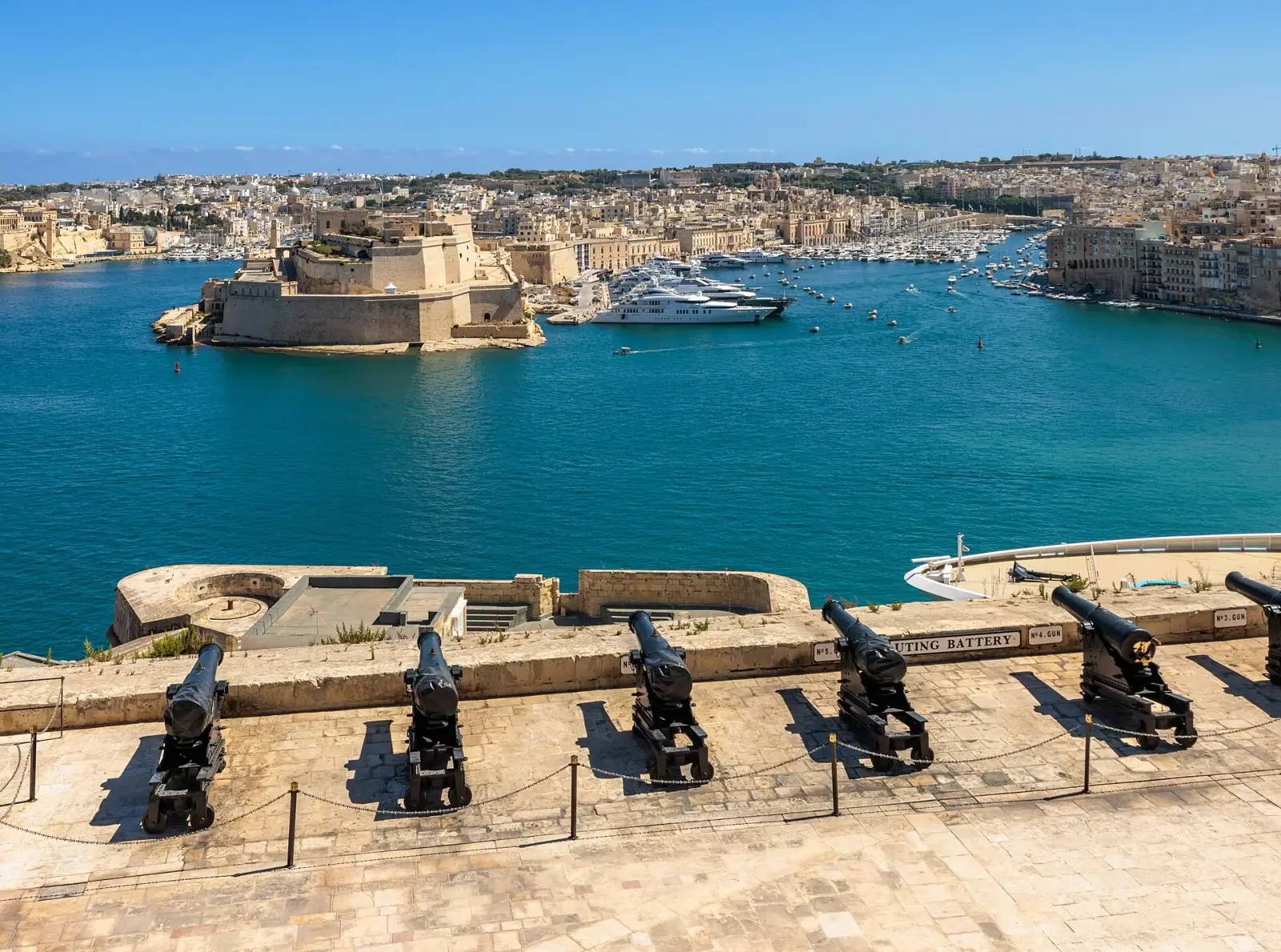 Saluting Battery cannons overlooking the Grand Harbour from Valletta's Upper Barrakka Gardens