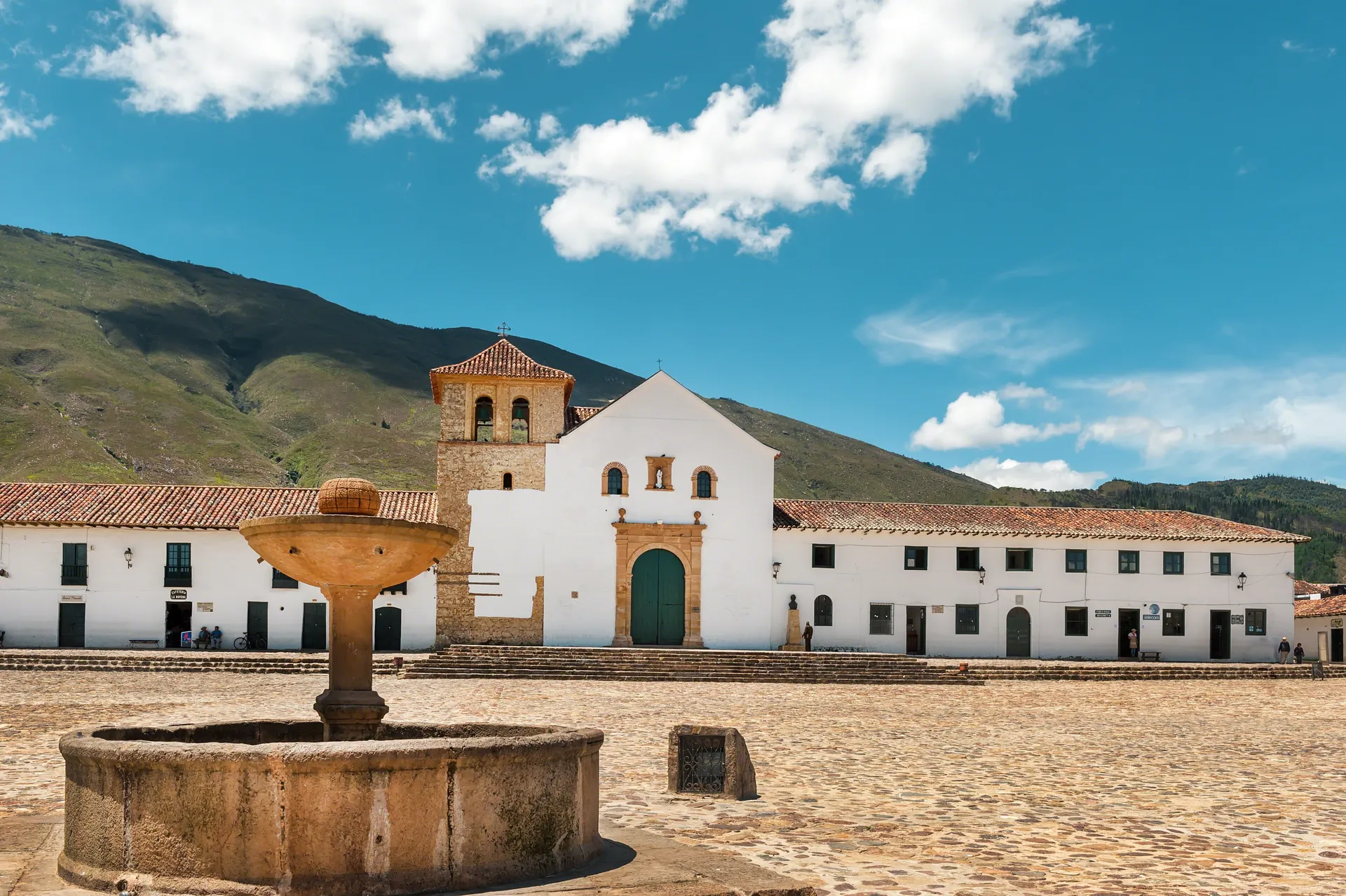 The cobbled Plaza Mayor and colonial church of Villa de Leyva, Colombia