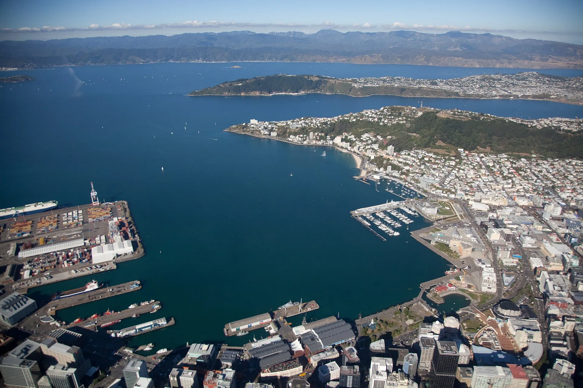 Aerial view of Wellington's Lambton Harbour, waterfront, and CBD with surrounding hills