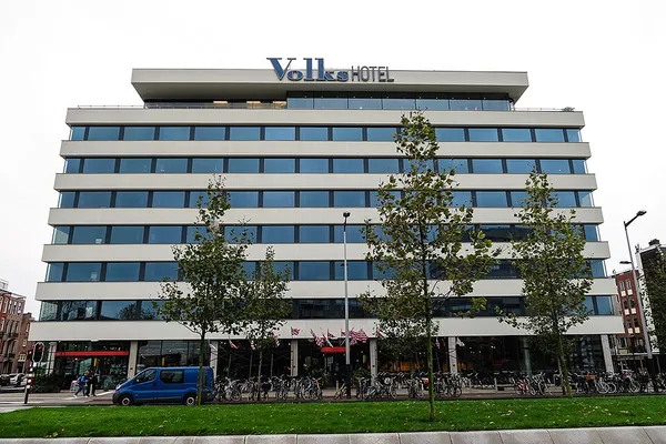 Volkshotel Amsterdam building exterior on Wibautstraat, home to the Werkplaats coworking cafe