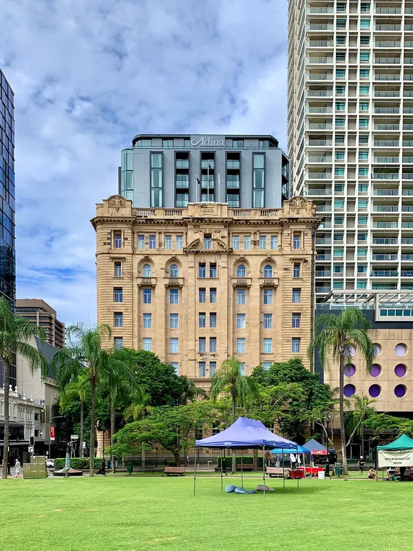 Adina Apartment Hotel Brisbane in the heritage Family Services Building with Adina signage, Brisbane CBD