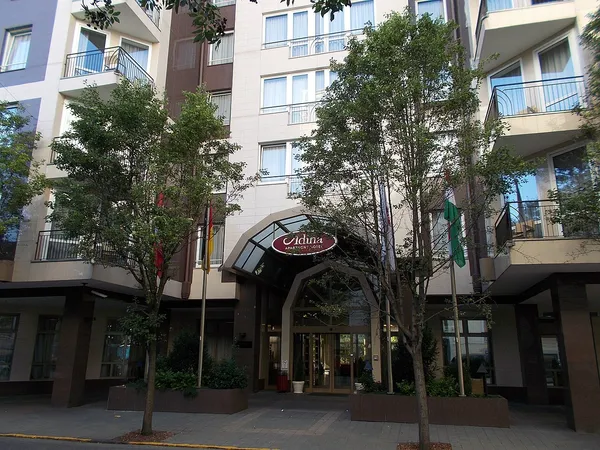 Adina Apartment Hotel Budapest entrance with hotel signage