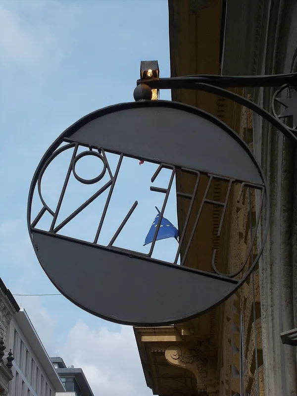 Cafe Kor hanging sign on Sas Street, Budapest