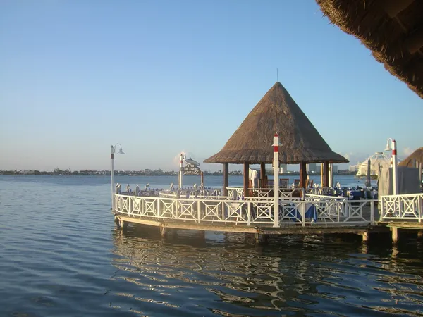 Lorenzillo's over-water palapa dining deck on Nichupté Lagoon, Cancún