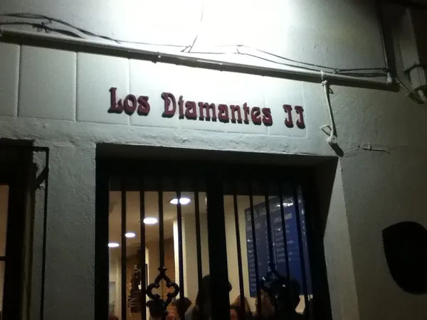 Bar Los Diamantes II storefront at night, Granada