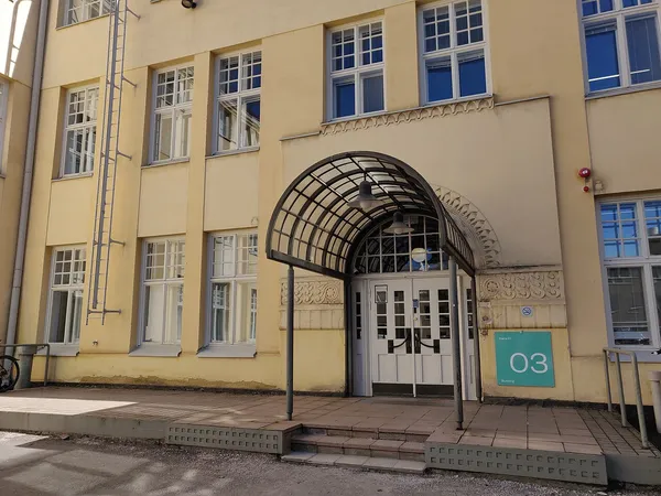 Entrance to Maria 01 startup campus in Helsinki with teal branding signage
